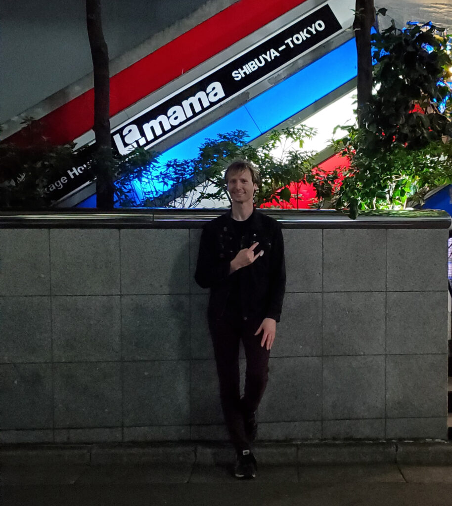 A picture of me posing in front of Shibuya La.mama, a rock club which my favorite band, The Yellow Monkey, got their start at.